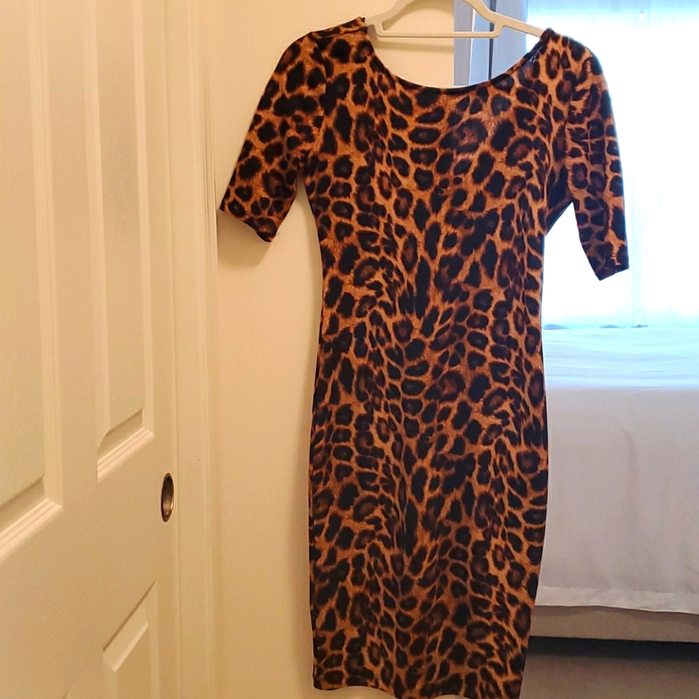 Half sleeve body con leopard dress